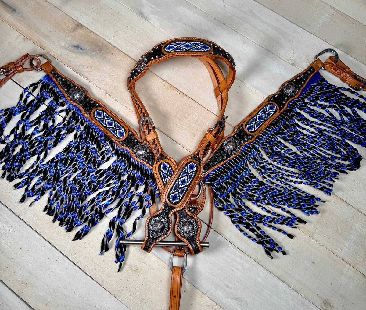 Beaded and tooled western tack set