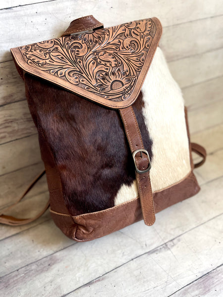 Leather and Hide Floral Tooled Flap Buckle Backpack