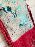 Turquoise Splatter Hide with Red Leather Fringe
