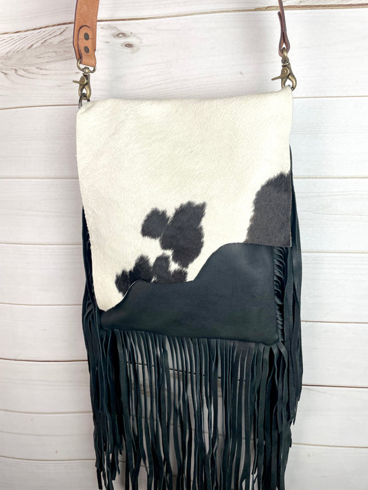 Black and White Raw Hide Flap on Black Leather with Fringe Crossbody Bag